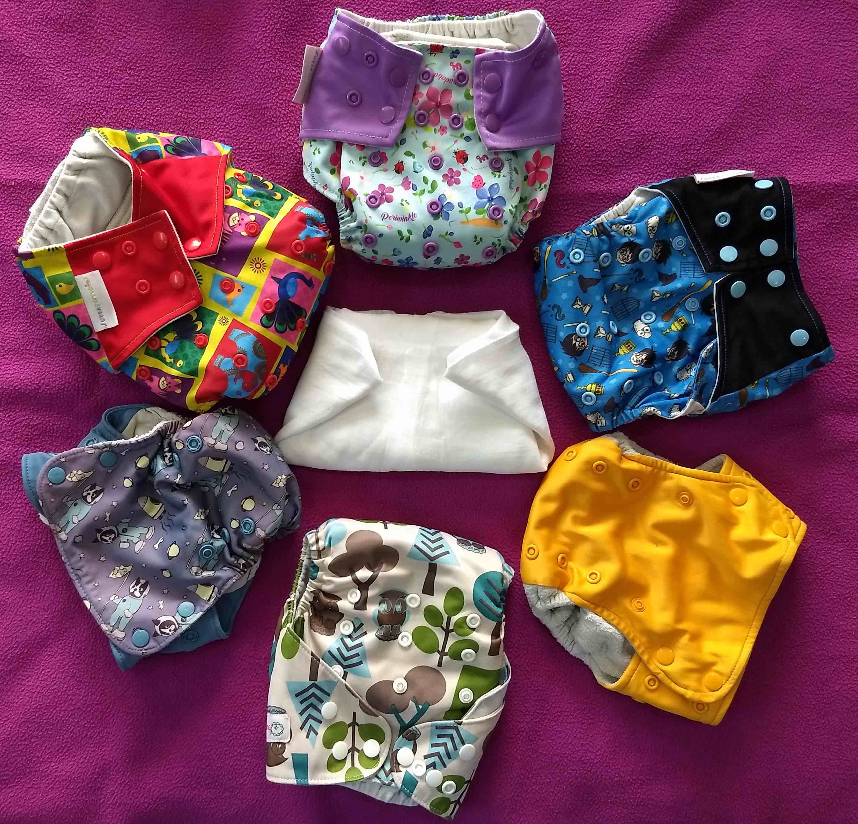 cloth diapers come in different designs and each may serve special purpose