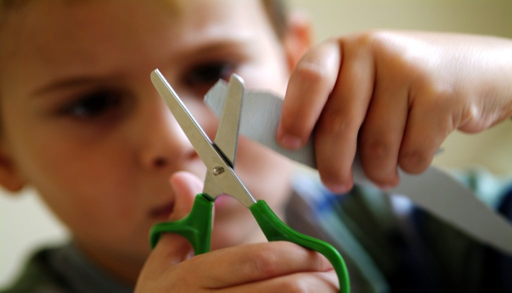 scissoring is a complex task for kids to learn